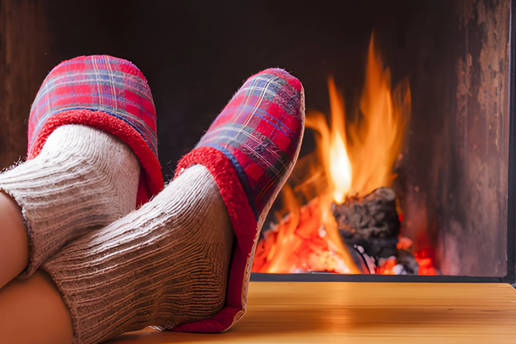 Warm feet by the fire in a cosy home